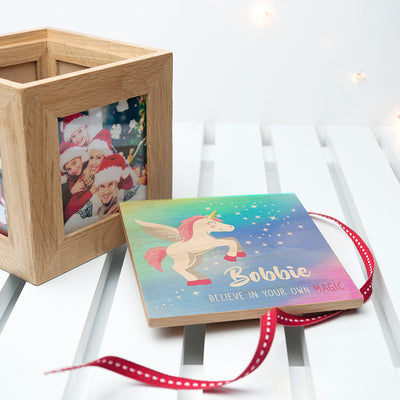 Personalised Baby Unicorn Photo Cube With Rainbow Background by Really Cool Gifts